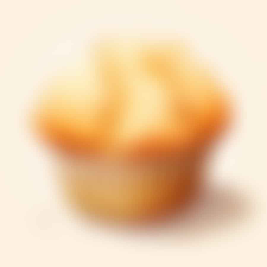 A close-up of a fluffy gluten-free muffin.